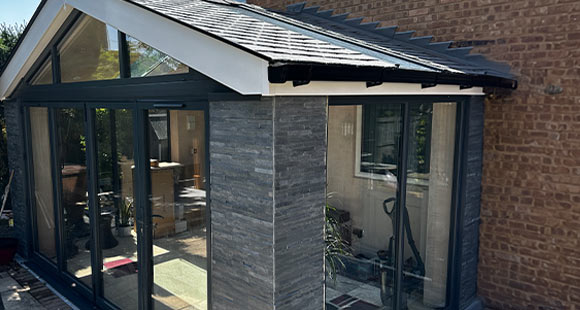 modern extension with large glass windows 